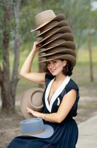 A model wearing 7 Akubra hats