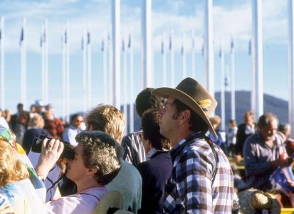 A man wearing an Akubra hat amongst a crowd