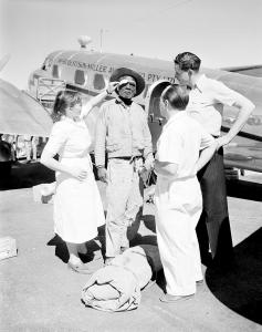 Health - Royal flying doctor service - Flying Doctor examines an Aboriginal stockman