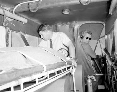 Patient being loaded onto Royal Flying Doctor Service plane