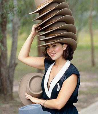A model wearing 7 felt Akubra hats