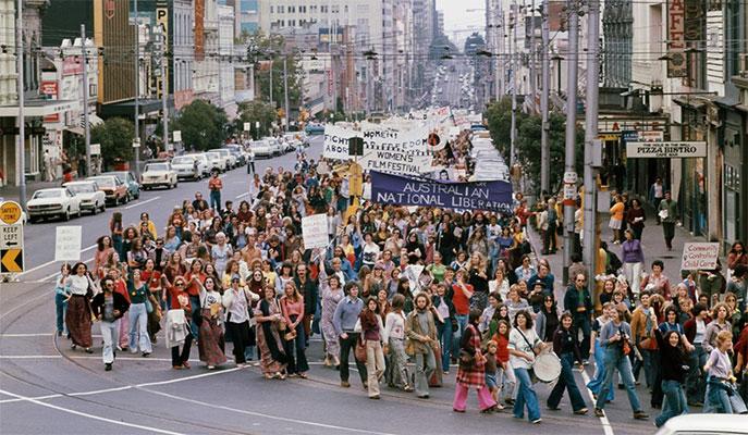 Women marching on a street in Melbourne.